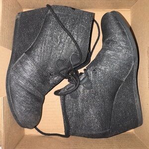 Tom’s shimmer black lace up wedges